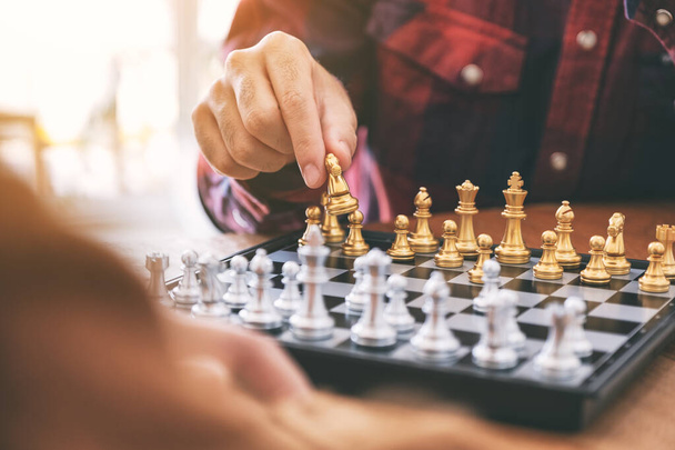 Closeup image of people moving and playing chessboard game together - Photo, Image