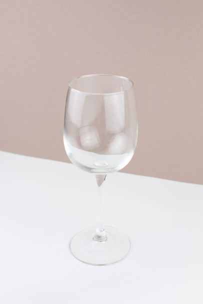 an empty beautiful wine glass on background - Фото, зображення