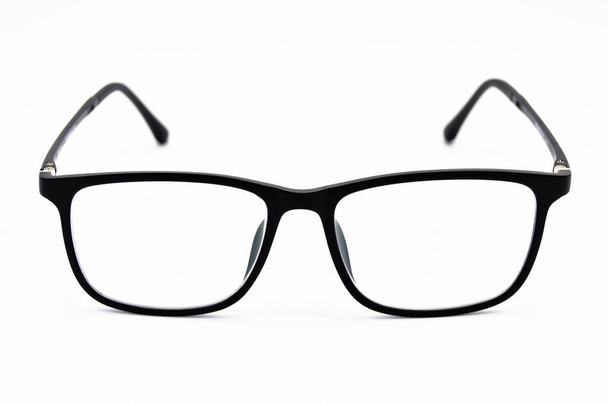 Modern design black framed plastic reading glasses, glasses isolated on white background - Photo, Image