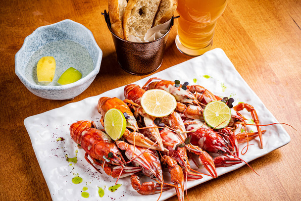 Crayfish. Red boiled crawfishes on table in rustic style - Foto, immagini