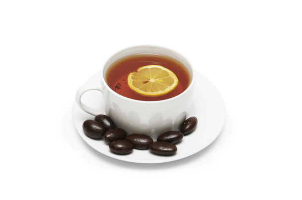 Чашка чаю з лимоном і шоколадом ізольовані на білому
 - Фото, зображення