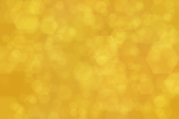 fond déconcentré abstrait doré avec des taches bokeh de forme hexagonale - Photo, image