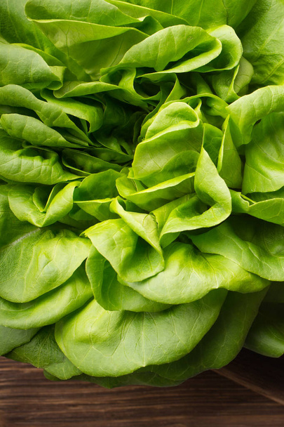 Vegetables, salads, beetroot, spinach. On a wooden background. - Fotó, kép