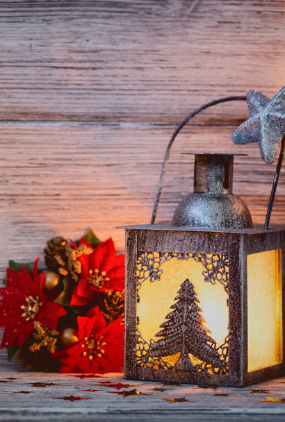 Lantern, Christmas decor, wooden background. - Foto, afbeelding