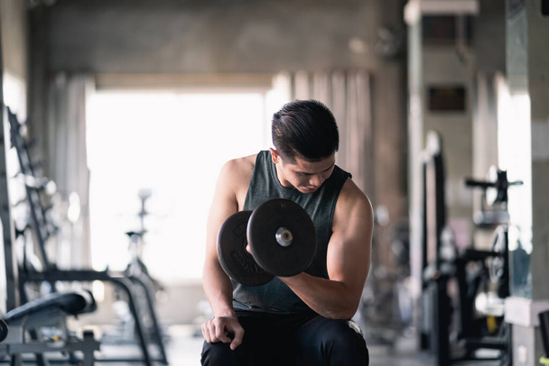 Close up of hand man using dumbbell exercise at gym, Sport concept - Foto, Imagen