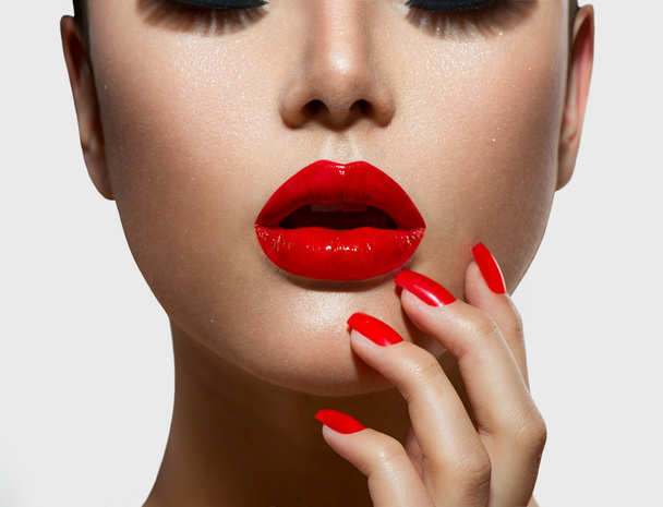 Red Sexy Lips and Nails closeup. Manicure and Makeup - Fotó, kép