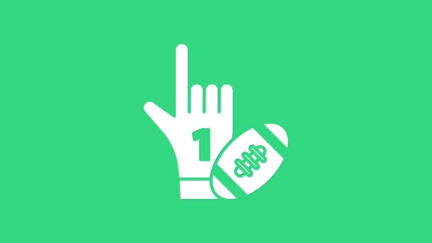 Witte nummer 1 een waaier handschoen met opgeheven vinger en amerikaanse voetbal bal pictogram geïsoleerd op groene achtergrond. Serie sportuitrusting. 4K Video motion grafische animatie - Video