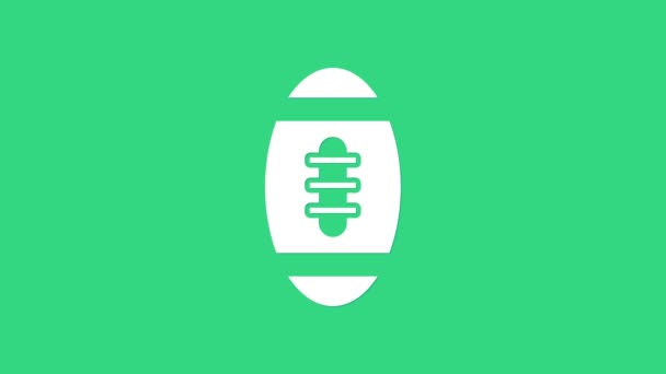 Icono de pelota de fútbol americano blanco aislado sobre fondo verde. Icono de pelota de rugby. Juego de deporte de equipo símbolo. Animación gráfica de vídeo 4K - Metraje, vídeo