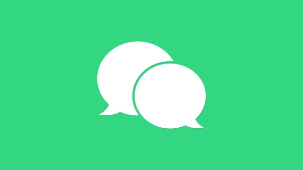 Icône de chat bulle de parole blanche isolée sur fond vert. Icône de message. Communication ou commentaire chat symbole. Animation graphique de mouvement vidéo 4K - Séquence, vidéo