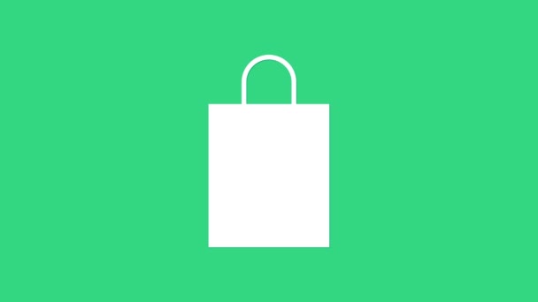 Fehér könyv bevásárló táska ikon elszigetelt zöld háttérrel. Csomag jel. 4K Videó mozgás grafikus animáció - Felvétel, videó