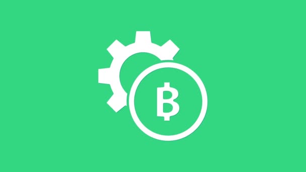 White Cryptocurrency coin Bitcoin icon isolated on green background. Gear and Bitcoin setting. Blockchain based secure crypto currency. 4K Video motion graphic animation - Footage, Video