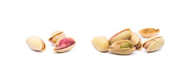 Pile of fresh pistachios isolated on white background - Photo, Image