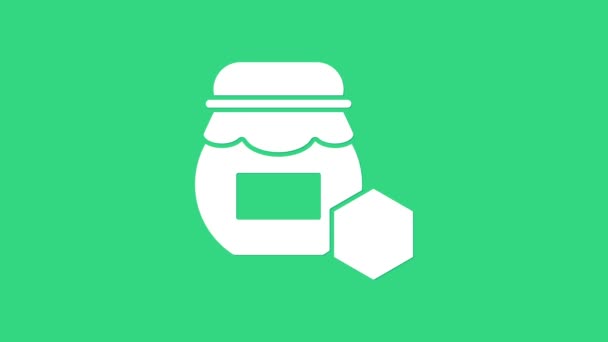 Vasetto bianco di icona di miele isolato su sfondo verde. Banco alimentare. Dolce simbolo del cibo naturale. Animazione grafica 4K Video motion - Filmati, video