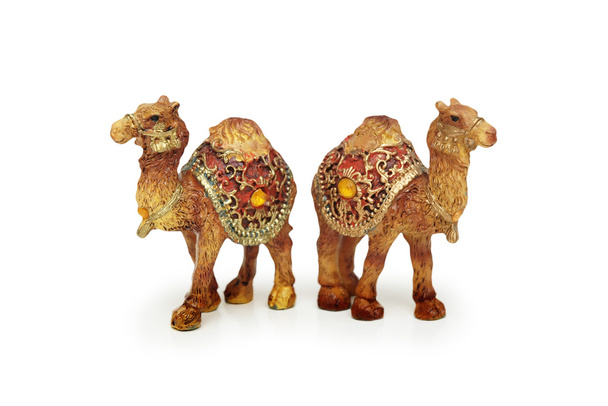 Figuras de dos camellos aislados en blanco
 - Foto, Imagen