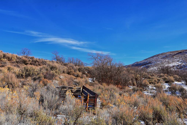 Winter snow mountain hiking trail views Yellow Fork Canyon County Park Rose Canyon by Rio Tinto Bingham Copper Mine, in winter. Salt Lake City, Utah. United States. - Photo, Image