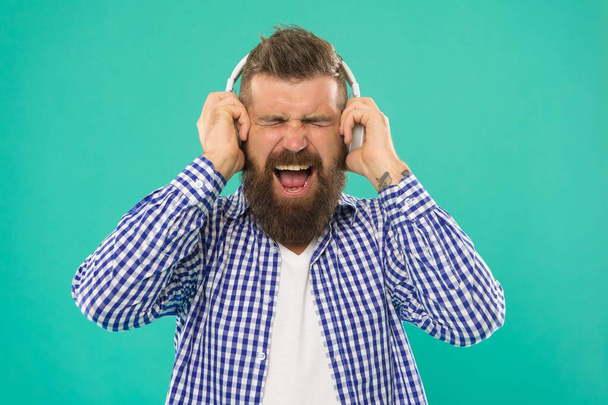 oh no. male express emotions. elearning with audio book. bearded hipster in checkered shirt. - Foto, afbeelding