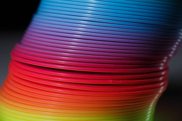 Plastic colored rainbow texture. Toy rainbow. - Foto, afbeelding