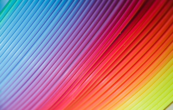 Plastic colored rainbow texture. Toy rainbow. - Foto, afbeelding