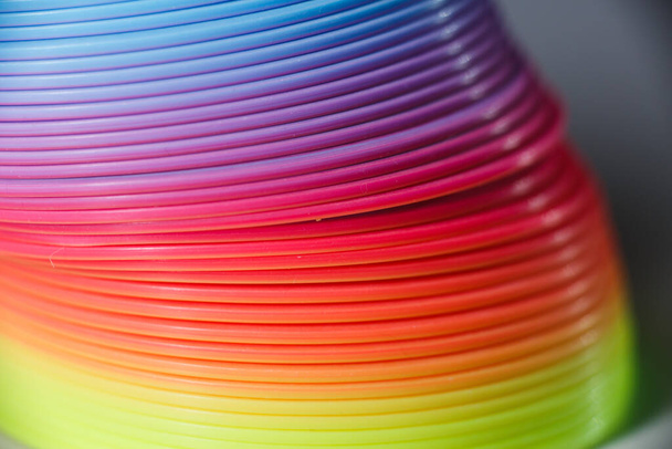Plastic colored rainbow texture. Toy rainbow. - Φωτογραφία, εικόνα