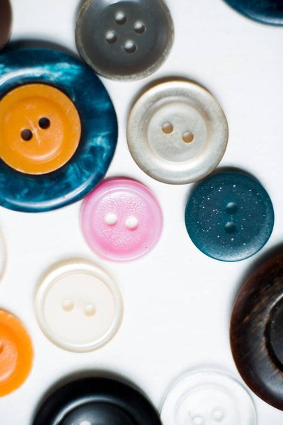 Buttons of different colors close-up. - Foto, afbeelding