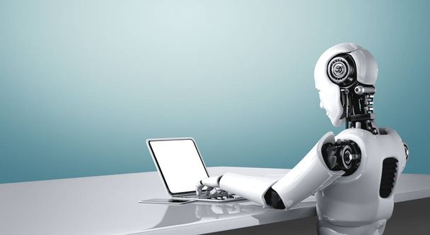 Robô humanóide usar laptop e sentar-se à mesa no futuro escritório - Foto, Imagem
