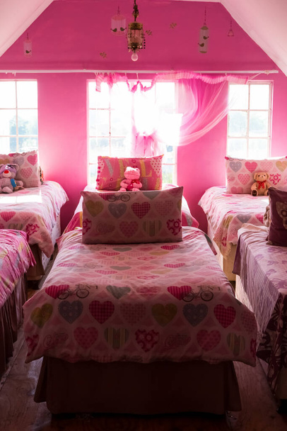 Johannesburg, South Africa - April 27, 2015: Inside of girls bedroom at children's orphanage charity  - Фото, изображение