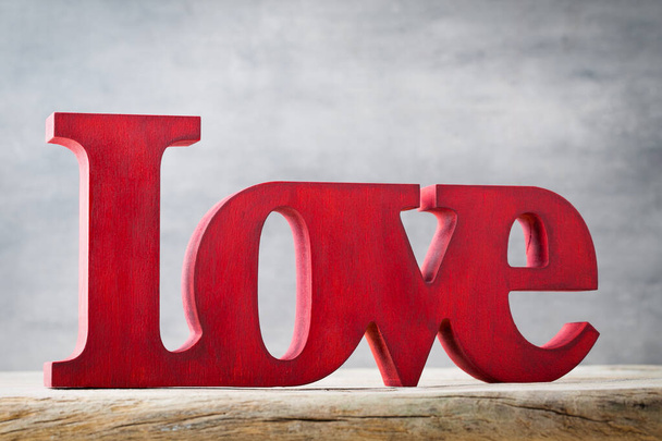 Love.Decor home. Valentines day message written in red wooden blocks. - Fotoğraf, Görsel