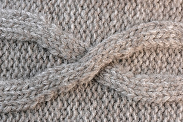 Textil texturizado fondo primer plano macro fotografía de un fragmento de un suéter de lana macho de tejido de máquina grande - Foto, imagen