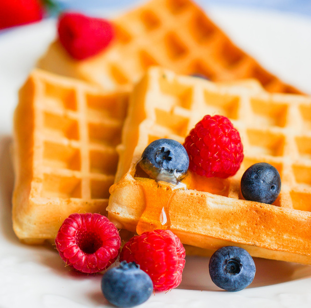 Belgian waffles with berries on rustic background - Foto, Imagem