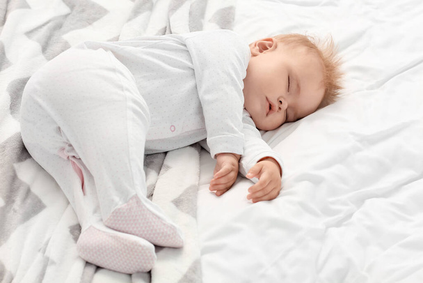 Cute little baby sleeping on bed - Photo, Image