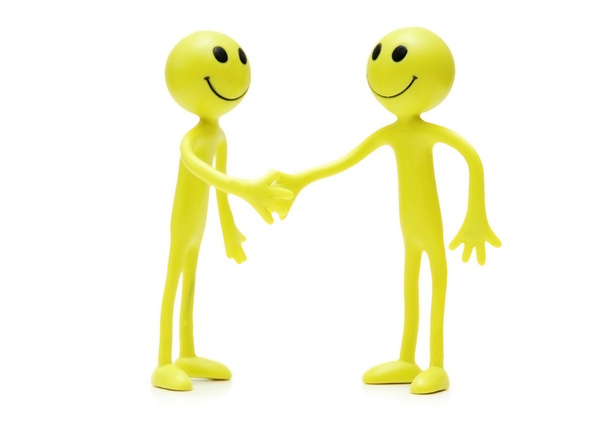 Figures of smilies shaking hands - Photo, Image