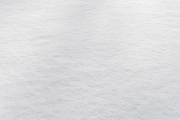 Bílé čisté lesklé sněhové pozadí textury. svěží sněhová bezešvá textura. zasněžený povrch detailu - Fotografie, Obrázek