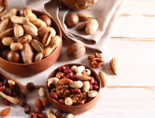 assorted nuts hazelnuts and almonds and coconut - Valokuva, kuva