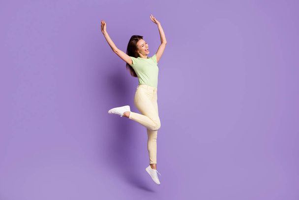 Full length body size view of her she nice-looking attractive lovely slender cheerful cheery girl jumping dancing enjoying rest party isolated bright vivid shine vibrant lilac violet color background - 写真・画像