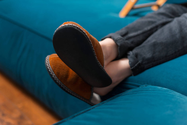 Close up photo selective focus of woman wearing slipper - Foto, afbeelding