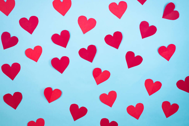 Blue background with red hearts - Foto, Imagem