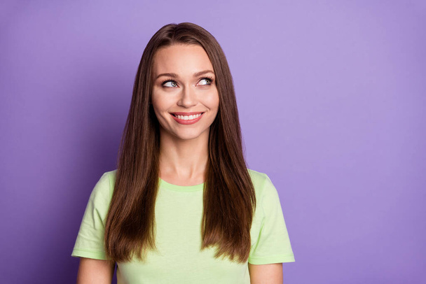 Photo portrait of dreamy woman looking to side isolated on vivid purple colored background - Photo, image