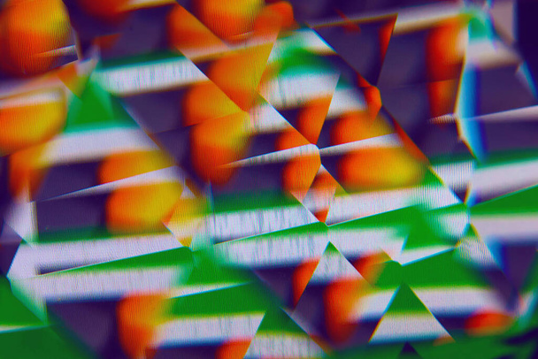 Абстрактний фон кольорових фігур, переглянутий крізь призму
 - Фото, зображення