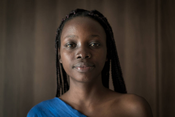 Young black African American woman portrait indoors - Фото, изображение