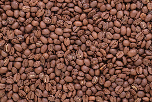 Reklamınız için kullandığınız taze kavrulmuş kahve çekirdekleri arka plan görüntüsü - Fotoğraf, Görsel