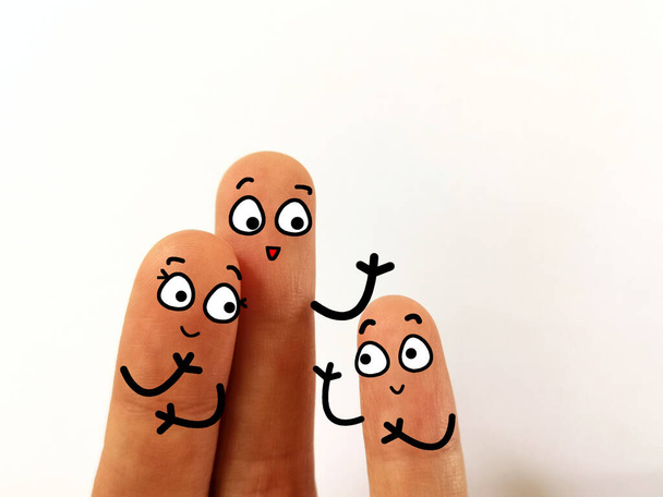 Three person are decorated as three person. They are a happy family - Foto, afbeelding
