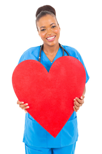 cute african doctor holding heart - Foto, imagen