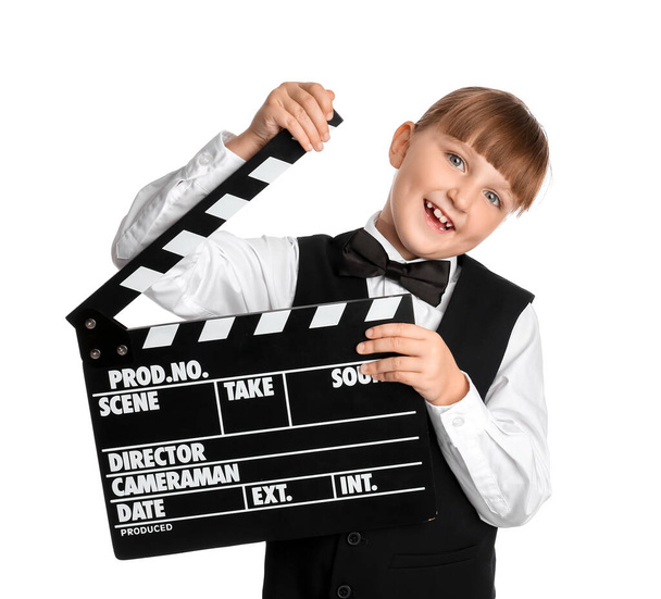 Little girl with movie clapper on white background - Photo, Image