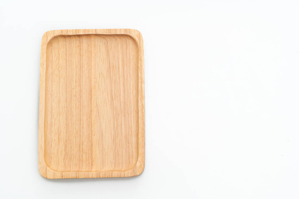 wooden tray or plate isolated on white background - Fotó, kép