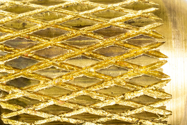 golden metal with diamond-shaped patterns, texture or background - Fotó, kép