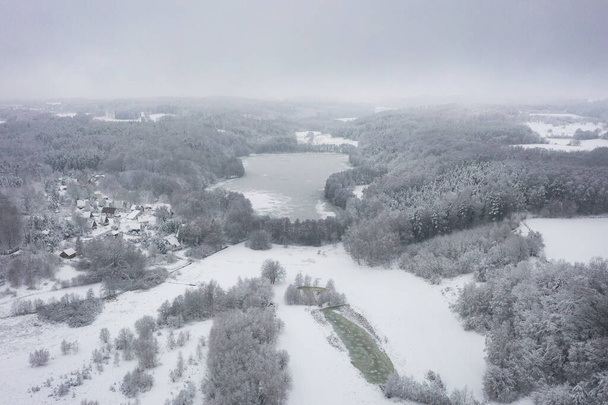 Aerial winter landscape with snowy forest. Poland - Fotó, kép