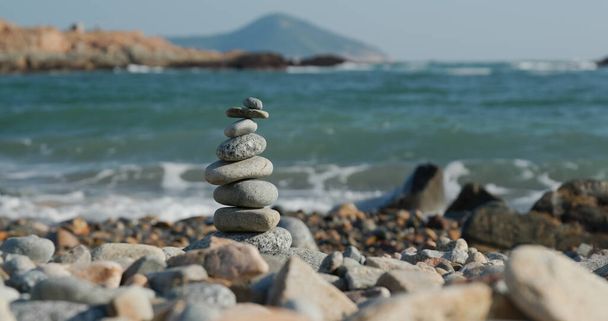 Balanced Pebble stone at beach - Photo, Image
