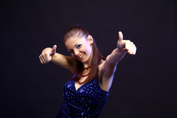 Portrait of a beautiful dancing girl - Foto, Imagen
