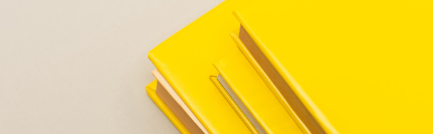 yellow copy books isolated on grey, banner - Photo, Image