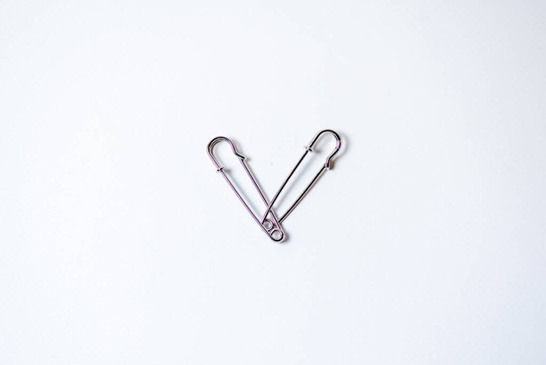 Heart shaped metal pins. Concept for Valentine's Day - Foto, Imagem